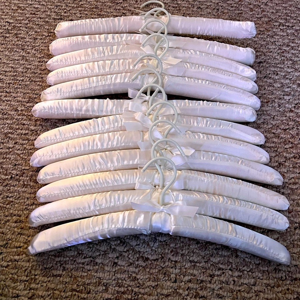 12 satin bridal hangers. Only used once for my wedding